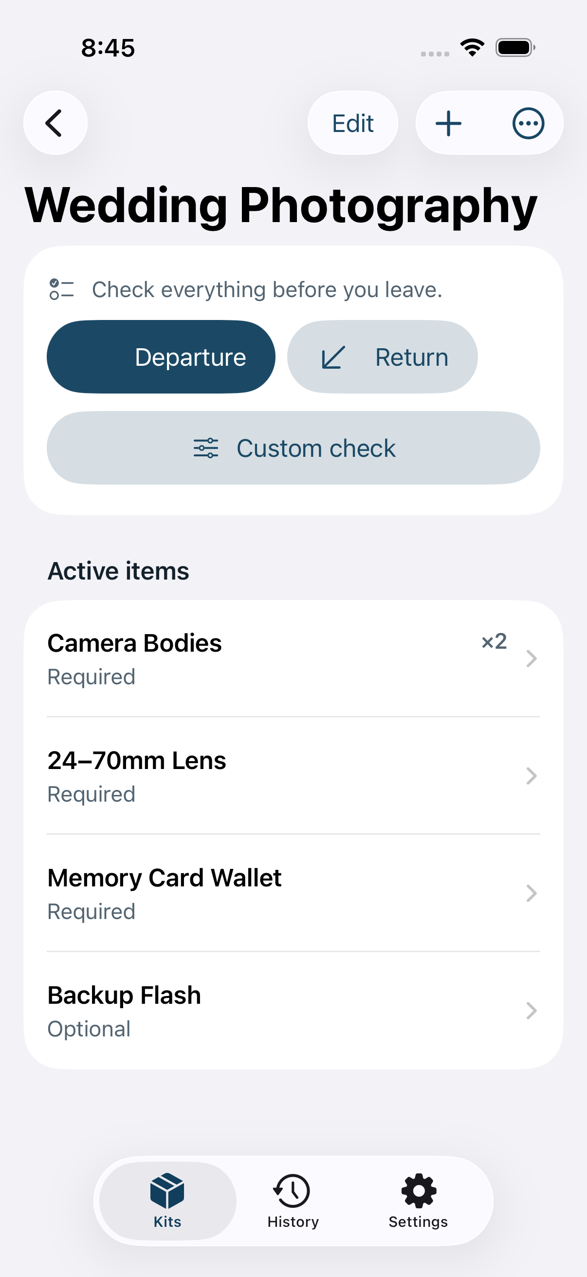 A LastItem kit detail screen with Departure, Return, and Custom check buttons above its item list.